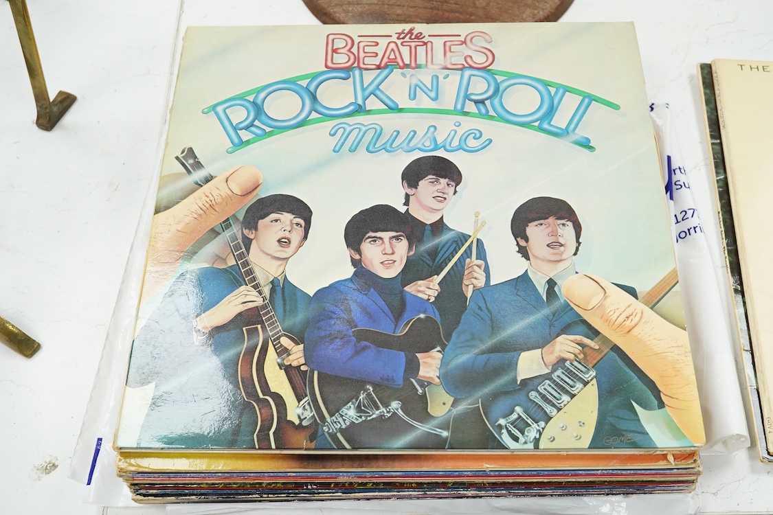Fourteen The Beatles related LP record albums, including; Rubber Soul, The Beatles at the Hollywood Bowl, With The Beatles, Beatles For Sale, Sgt. Pepper, Revolver, McCartney II, Wings Over America, the Concert for Bangl